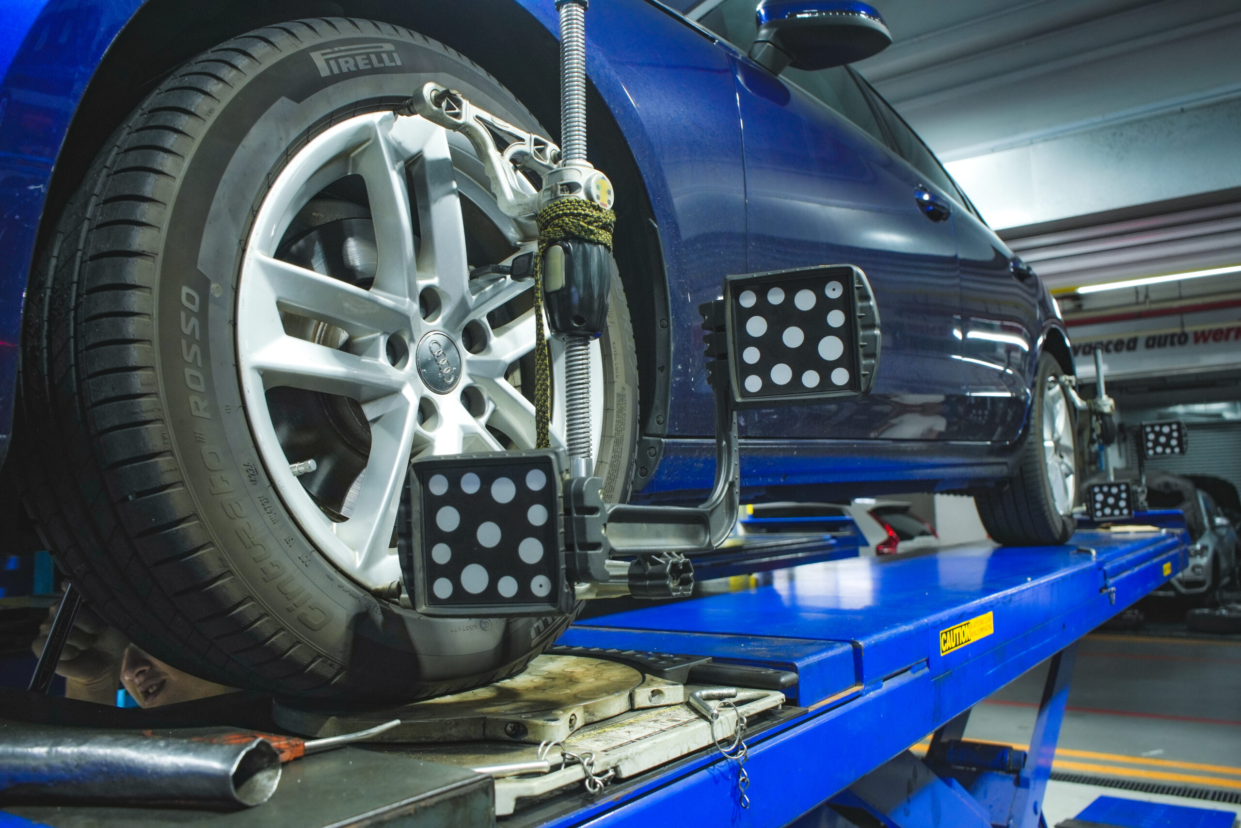 Precision wheel alignment in progress at City Tyre Auto Sin Ming car workshop